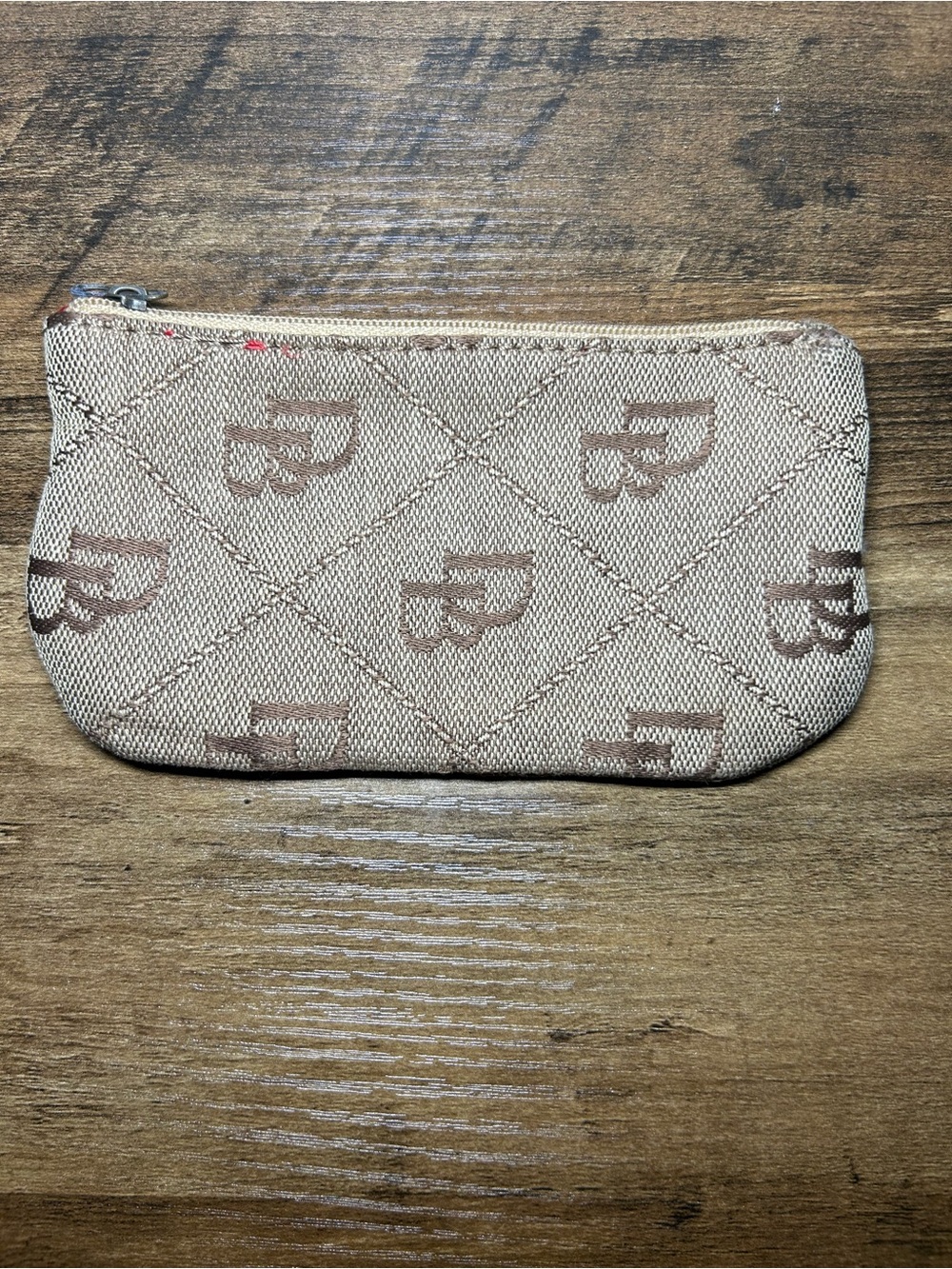 Dooney & Bourke Tan Monogram Mini Zip Pouch